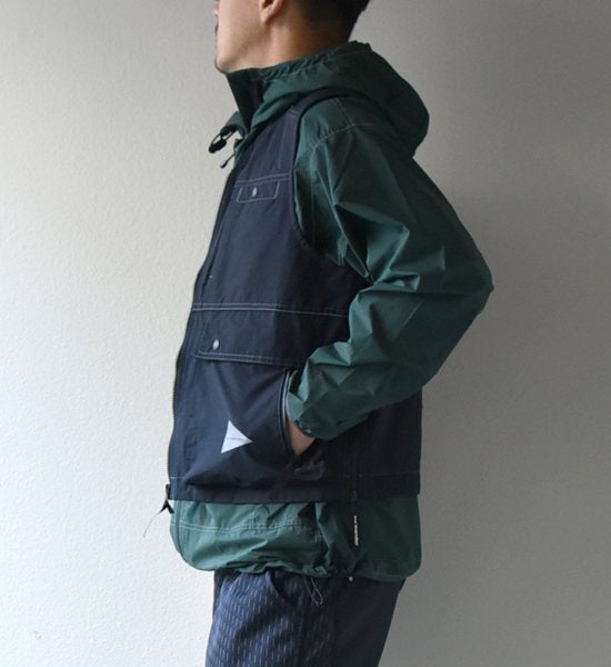 ★40%off【and wander】アンドワンダー men's laser hole nylon taffeta vest "Charcoal"