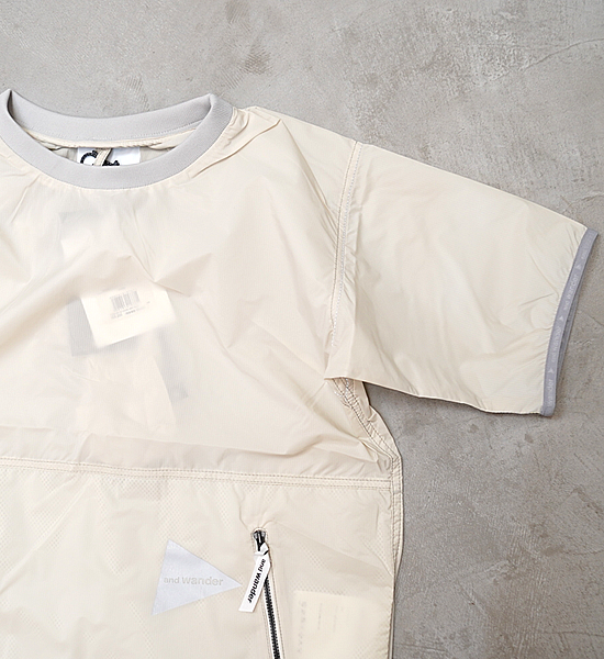 【and wander】アンドワンダー women's PERTEX wind T "2Color"