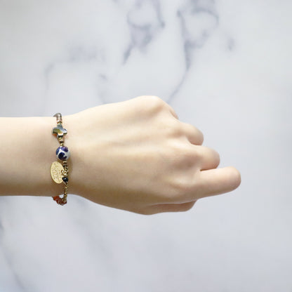 【La・Fall Marrón】亀甲天珠×オレンジガーネット×モスコバイト×アバロニシェル×スモーキークォーツ ブレスレット